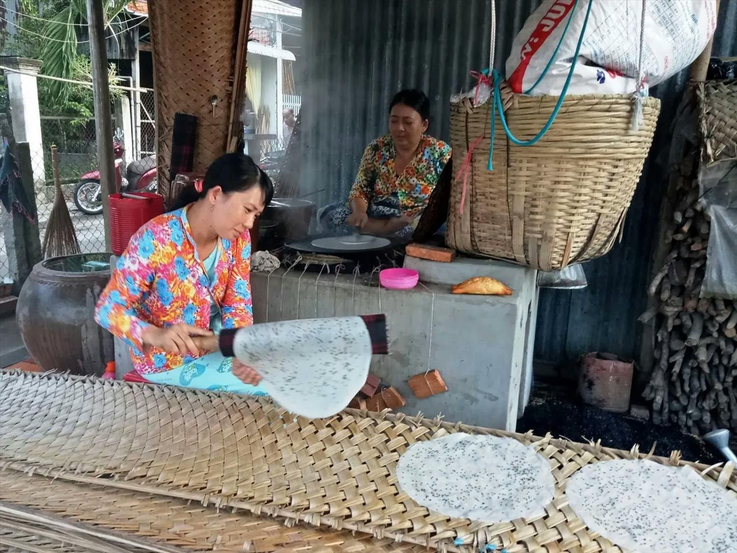 Woman pouring rice paper liquid